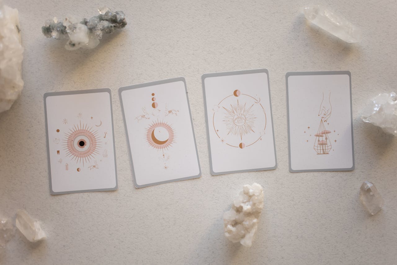Top view of tarot cards and crystals, perfect for spiritual and mystical themes.